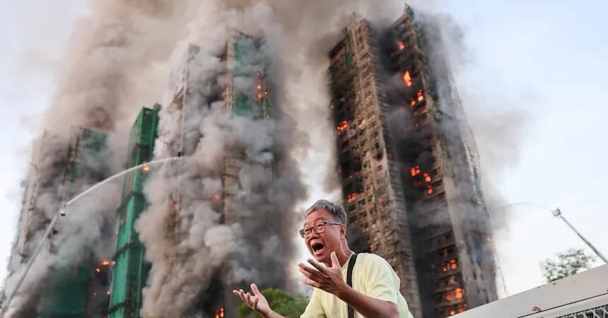 Deadly Hong Kong high-rise blaze claims at least thirteen lives as firefighters battle towering flames, search desperately for trapped residents